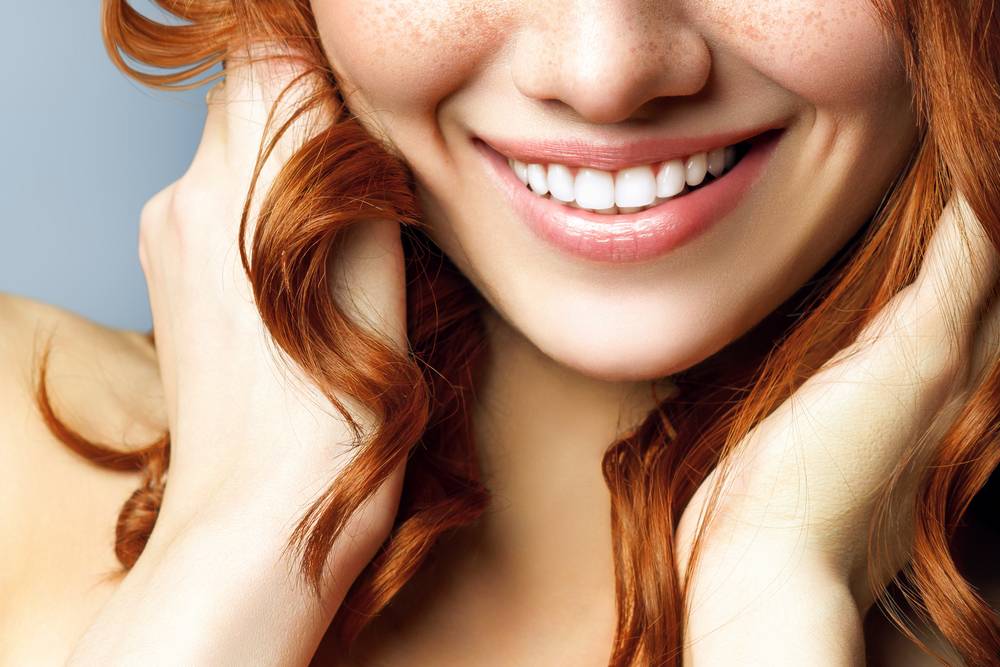 woman's white smile - cosmetic dentistry in Scottsdale, AZ